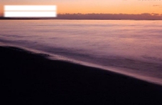 夕阳下海滩图片